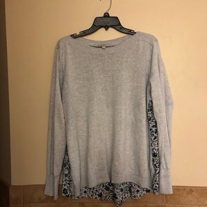 Grey sweater with flower blouse in back